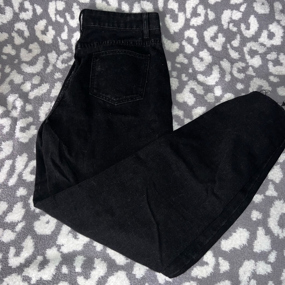 black ripped jeans